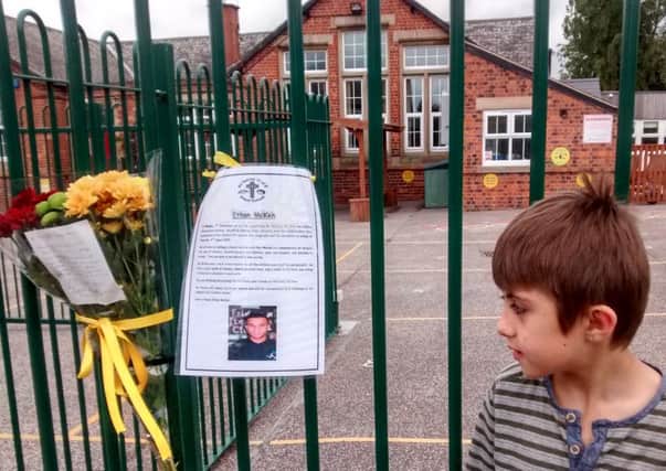 Pupils of Huthwaite All Saints C of E INfant School paid tribute to sports teacher Ethen McKen , who died after he was reported missing in the seai n Bulgaria. Pictured is pupil Rocco Celeini, 7.