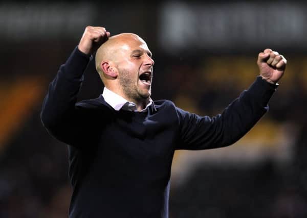 Notts County v Mansfield Town
English League Football - Sky Bet League Two
Meadow Lane Stadium, Nottingham, England.
14th August 2015

Mansfield Town Manager Adam Murray celebrates the 2-0 win.

Picture by Dan Westwell (PLEASE BYLINE)

dan.westwell@btinternet.com
07793 733140