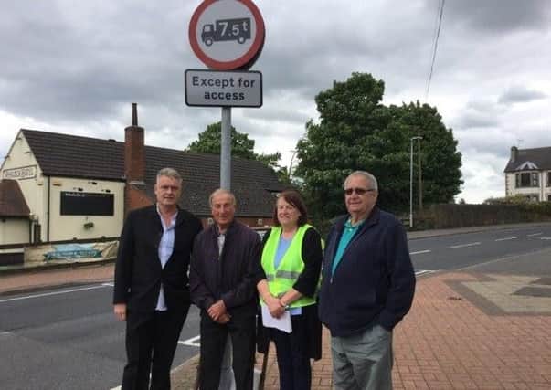 CAMPAIGNING -- councillors and residents pictured earlier this summer on Chesterfield Road.