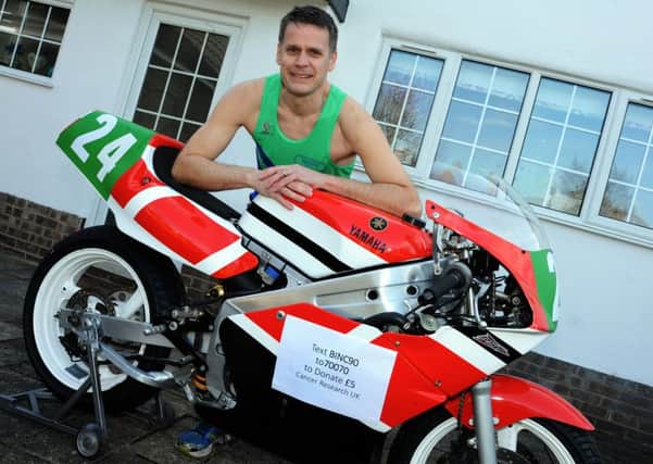 Motorcyclist Dave Binch ran the 36 mile Isle of Man TT course in August to raise money for Cancer Research UK.