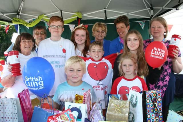 Young supporters with officials at a Breathe Easy fundraiser in Eastwood