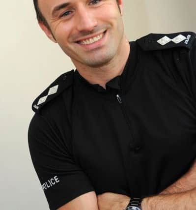 Police officer James Oliver has won a bravery award for pulling a woman out of the river Trent.