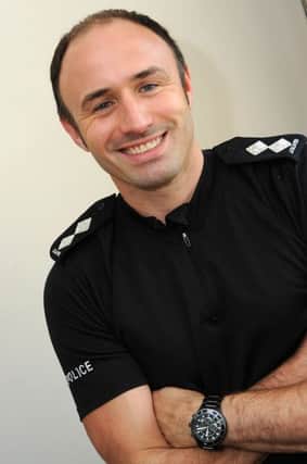 Police officer James Oliver has won a bravery award for pulling a woman out of the river Trent.