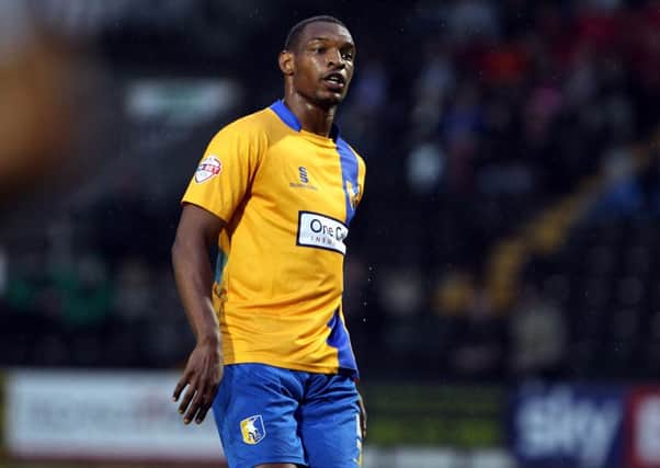 Mansfield Town's Krystian Pearce completes his suspension on Saturday. Picture by Dan Westwell