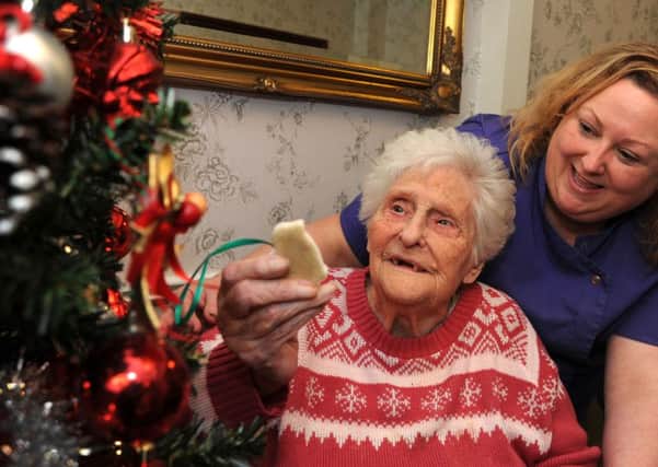 Marie Martin with Joan Greenlees , who at 95, still likes to get involved with the many activities that Marie puts on as the Activities Co-ordinator at Alexandra House.