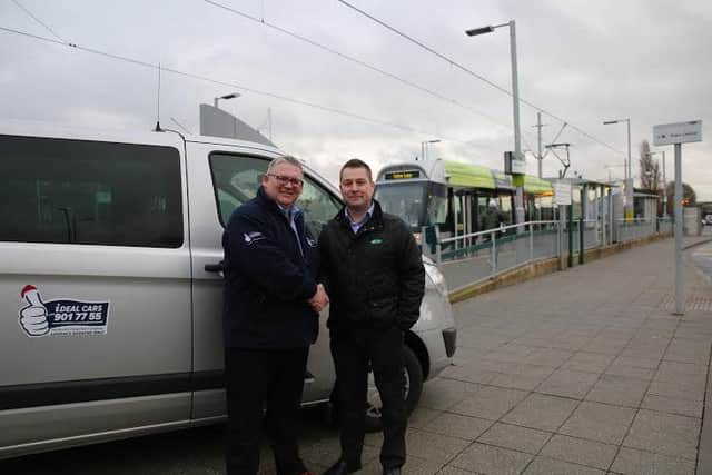 iDEAL CARS director, Ian Brough (left) and NET marketing manager, Jamie Swift (right) at Hucknall tram stop.