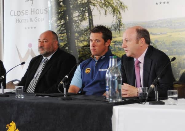 WILY WYLIE -- Graham Wylie (right), who is one of the high-profile owners to have top horses in training with Irish champion Willie Mullins. He is pictured here at a golf event with Worksop player Lee Westwood (centre).