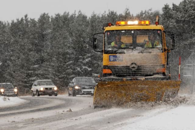 A gritter in action. Stock picture.