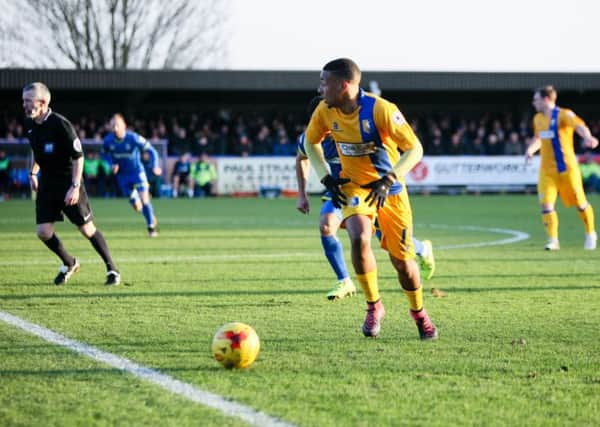 Mansfield Town's Reggie LAmbe looks to make the pass - Pic by Chris Holloway