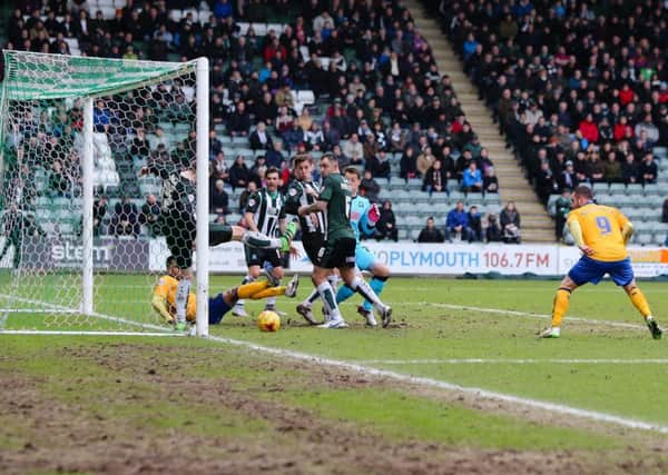 Goal mouth scramble  - Pic Chris Holloway - The Bigger Picture