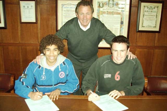 Jamie Jackson and Jamie Lowry signing their first ever professional football contracts with Roy McFarland in attendance.  left to right Jamie Jackson, Roy McFarland, Jamie Lowry.