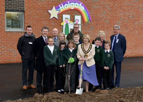Official opening of Holgate Primary School, Hucknall. Coun Sybil Fielding helps to plant a tree to commemorate the new school