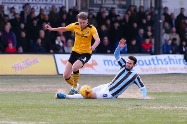 Mansfield Town's Chris Clements gets the tackle in - Pic Chris Holloway