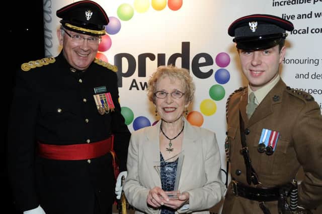 Chad Pride Awards.
Jane Thacker received her award for Outstanding Bravery from Colonel (Rtd) David Sneath, left, and Capt. Lloyd Watts.