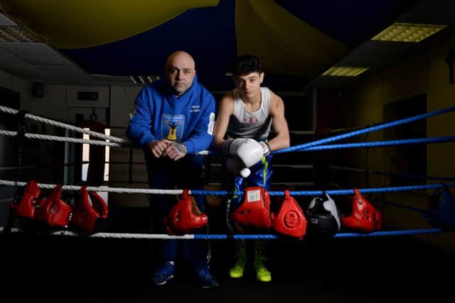 Nico Leivars, 16, Stags Boxing Academy, Mansfield, pictured with Head Coach Jules Leivars