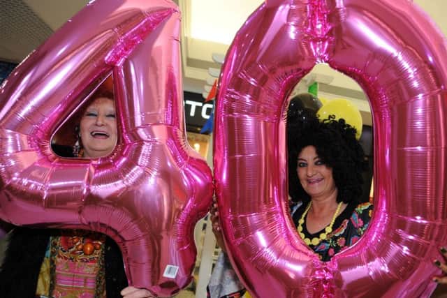 Barbara Durose and Diane Williams get into the spirit of the celebrations when they donned 70's gear to do their jobs of keeping the Four Seasons Shopping Centre clean and tidy for it's 40th birthday bash on Saturday.