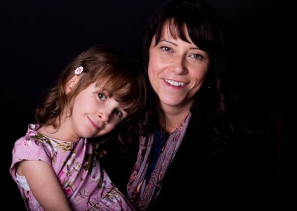 Holly Evans 6, from Skegby who has a rare  disease called Glutaric Aciduria type one. She is taking part in a photographic project called Rare by a charity called same but different. Pictured with mum Kelly Cleveland.  Pic by Ceridwen Hughes