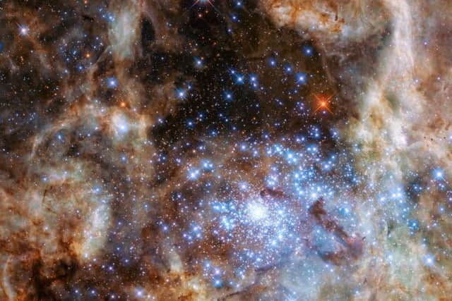 Monster star cluster R136 can be seen at the lower right of the image taken by the Hubble telescope. Photo: NASA, ESA, P Crowther (University of Sheffield)