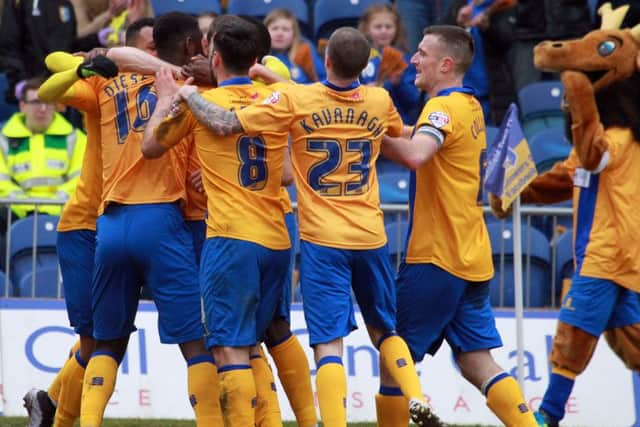 Mansfield Town v Portsmouth on Saturday March 19th 2016. Stags player Matt Green scores. Photo: Chris Etchells