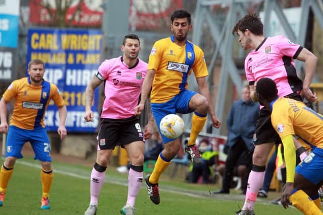 Mansfield Town v Northampton Town, Monday March 28th 2016. Mansfield player Mal Benning in action. Photo: Chris Etchells