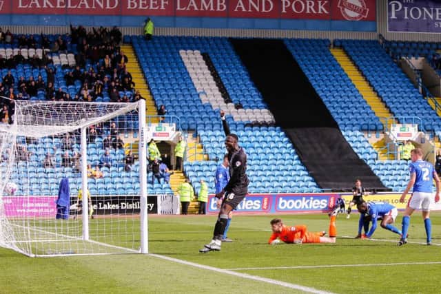 Mansfield Town's Emmanuael Dieseruvwe celebrates Colin Daniel's goal - Pic Chris Holloway