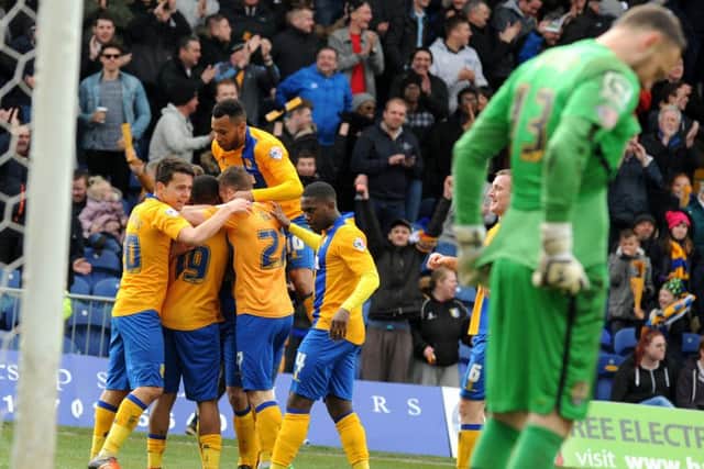 Mansfield Town v Notts County.
Celebrations after Reggie Lambe makes it 4-0.
