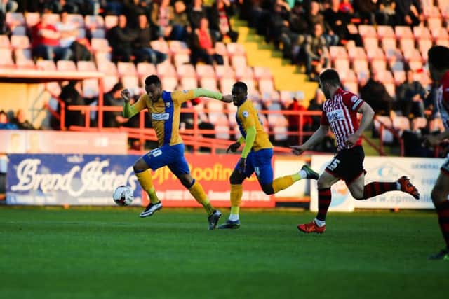 Mansfield Town's Matt Green heads for goal - Picture Chris Holloway