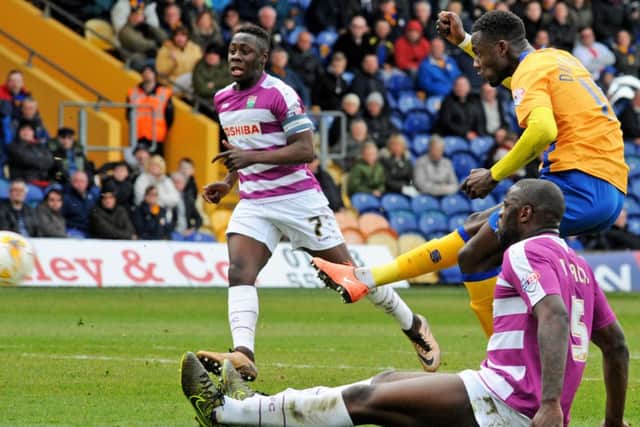 Mansfield Town v Barnet.
Dieseruvwe shoots to score Mansfield's equalizer.
