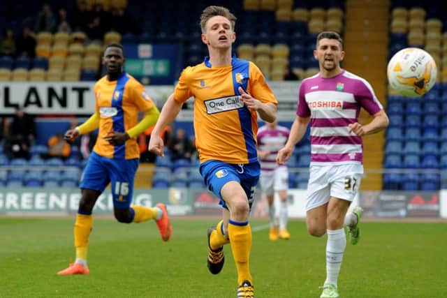 Mansfield Town v Barnet.
Baxendale chases after a forward ball in the first half