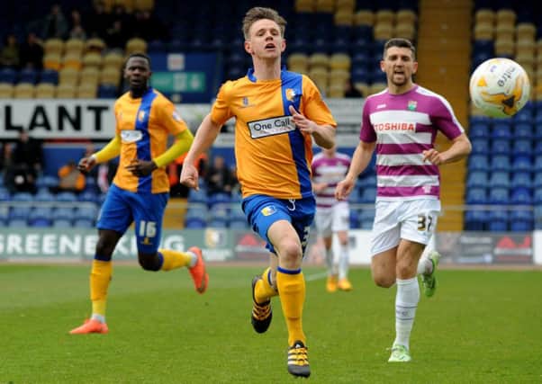 Mansfield Town v Barnet.
Baxendale chases after a forward ball in the first half