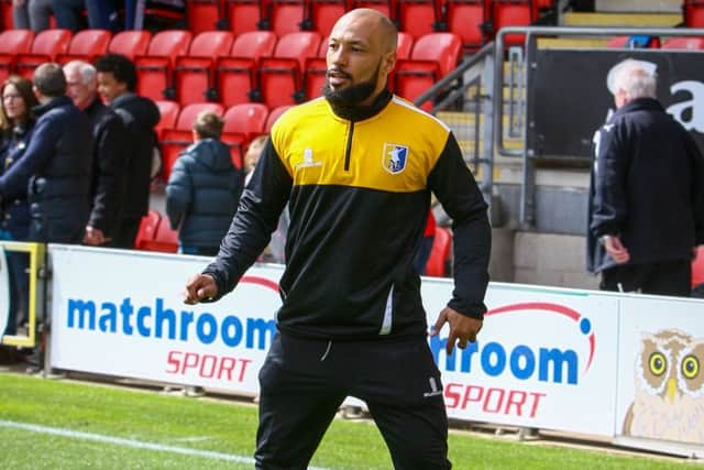 Karl Hawley working on the Mansfield Town bench - Picture Chris Holloway