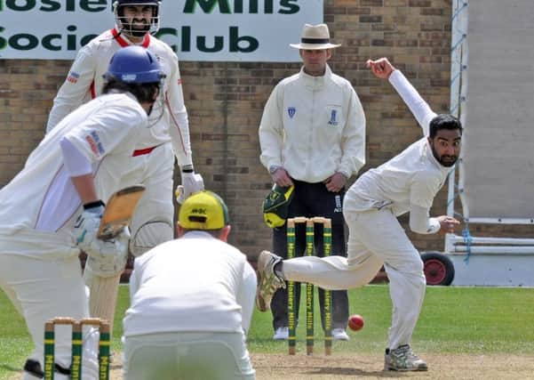 KING KUNAL -- Mansfield Hosiery Mills bowler Kunal Manek on his way to a five-wicket haul against local rivals, Welbeck, on Bank Holiday Monday.