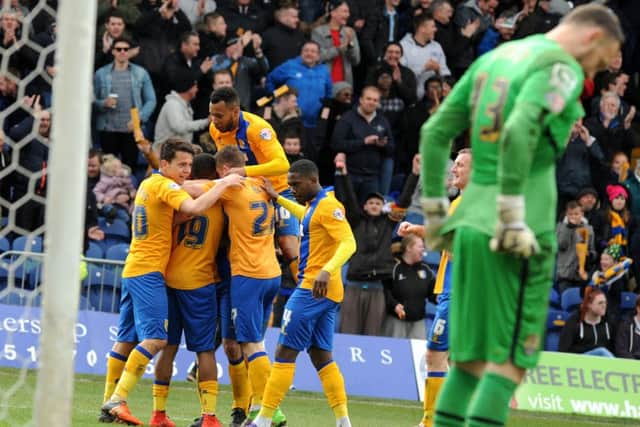Mansfield Town v Notts County.
Celebrations after Reggie Lambe makes it 4-0.