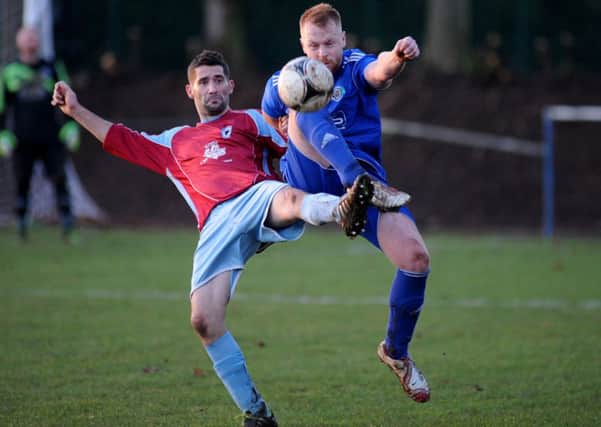 Hucknall Rolls Leisure and Bulwell are pictured in action last season. Both clubs are now set to disband.