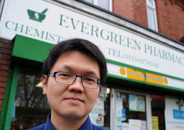 Pharmacist William Wong at his Evergreen Pharmacy on Highbury Road, Bulwell.