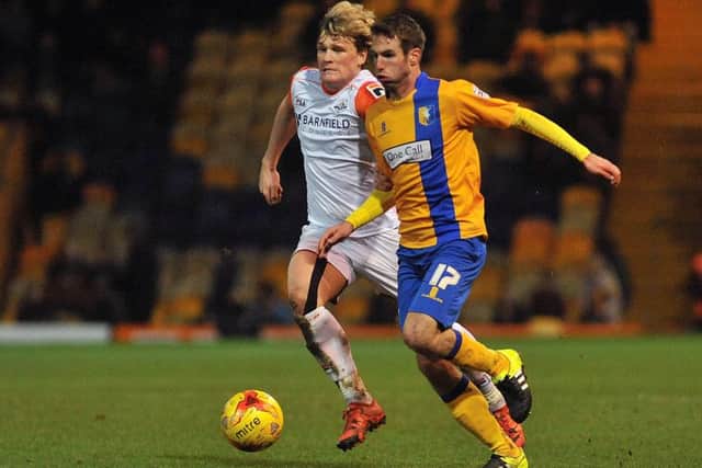 Mansfield Town v Luton Town - Skybet League Two - One Call Stadium - Saturday 23 jan 2016Matty Blair battles with Cameron McGeehan