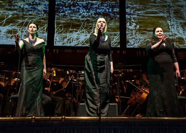 G(div)TTERDÃ„MMERUNG by Wagner;
Opera North;
Semi-staged concert performance;
Leeds Town Hall;
Leeds, UK;
11 June 2014;

KATHERINE BRODERICK as Woglinde (left);
MADELEINE SHAW as as Wellgunde;
SARAH CASTLE as Flosshilde (left);

RICHARD FARNES - Conductor;
PETER MUMFORD - Concert Staging and Design Concept;
PETER MUMFORD - Lighting and Projection Design;

Photo credit: Â© CLIVE BARDA/ArenaPAL;