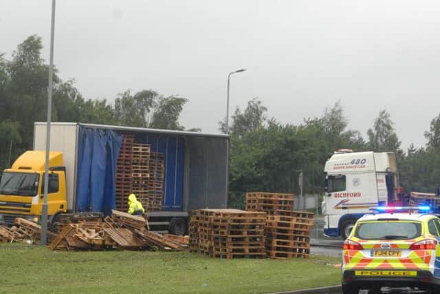 Police continue to manage traffic as a clear-up operation was undertaken this afternoon outside Hucknall.