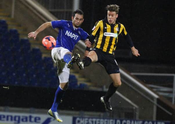 New Stags signing Kevan Hurst, pictured playing for Southend United, robs Chesterfield's Sam Hird of the ball