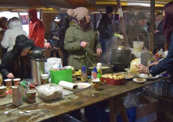 Volunteers serving food at Mansfield Soup Kitchen which has been given two weeks notice to quit.