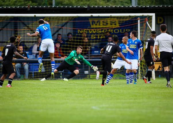Mansfield town's Mal Benning scores - Pic by Chris Holloway