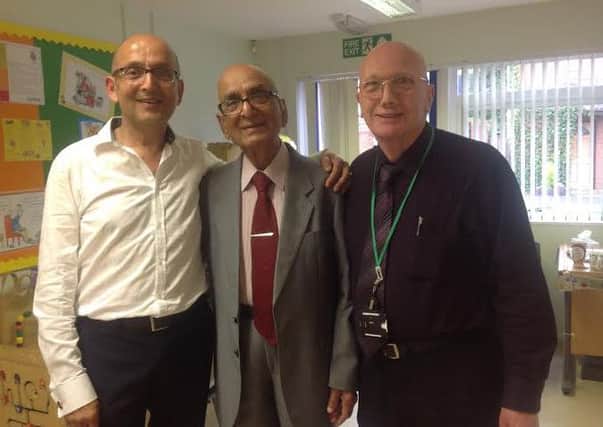 Pictured from left, Kevin DMello, his father Benedict and John Wilmot