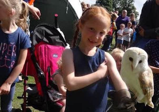 Kids enjoyed the sunshine and met birds of prey at the family fun day, hosted by the Friends of Hucknall Childrens Centre.