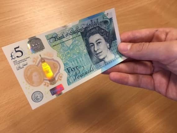 The new five pound notes came into circulation earlier this month.