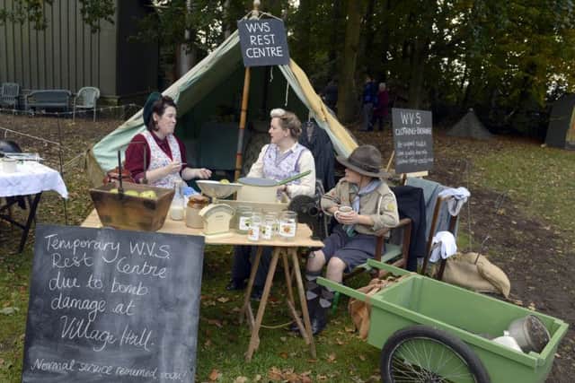 WARTIME SOLACE -- a WRVS rest centre, re-enacted by Carol Deane and Paula Westerside-Downes and her 12-year-old son, Finley. (PHOTO BY: Sarah Washbourn)