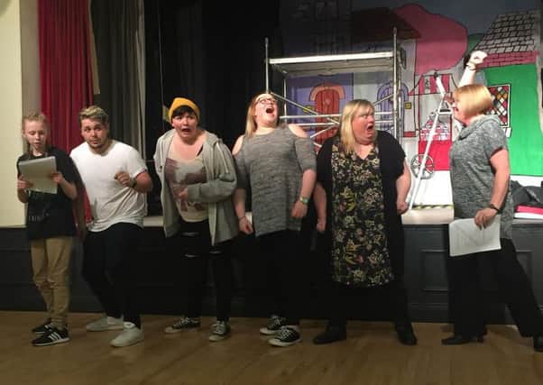 The Lovelace Theatre Group in rehearsals for their forthcoming pantomime of The Three Musketeers.