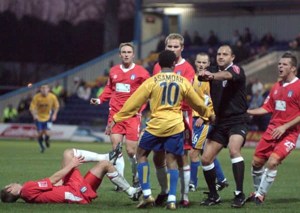 Derek Asamoah is sent off for Stags in an FA Cup tie when Colchester last visited Field Mill back in 2004.