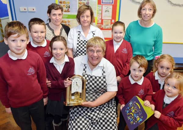 Hucknall Leen Mills primary school chef retires. Lynn Barton with Caroline Richmond asst cook, Cathy Pascoe senior midday suppervisor, judith Turner and pupils from foundation and year 4.