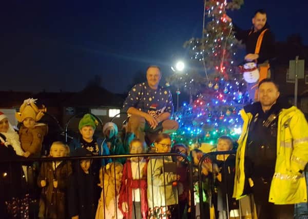 Selston residents decorate the village Christmas tree after an appeal on the #SelstonTogether Facebook group.