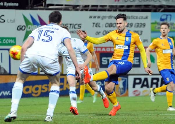 Mansfield Town v  Oldham Athletic.
Chris Clements' shot goes wide during first half action at the One Call Stadium on Tuesday night.